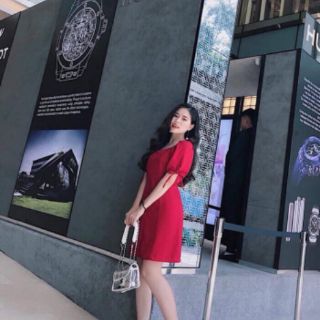Đầm nút bọc tay nơ