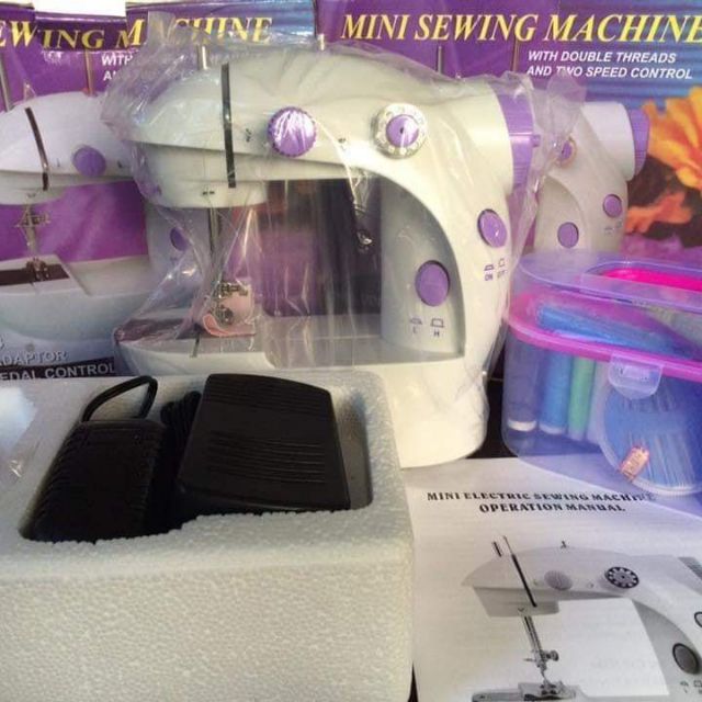 Máy may mini và hộp kim chỉ