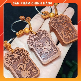 Móc treo khóa xe khắc Phù Bình an gỗ đào đỏ