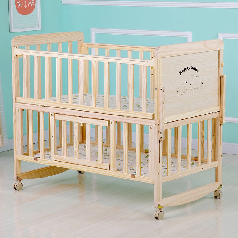 nôi em bé gỗ nguyên tấm không sơn giường sơ sinh với màn chống muỗi con lăn BB có thể được mở rộng và đa chức năng