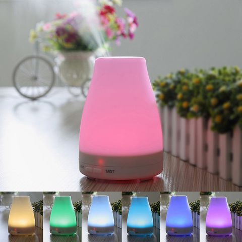 Máy phun sương tạo ẩm tặng tinh dầu 10ml
