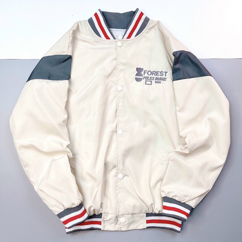 Áo khoác dù 2 lớp nút bấm thêu gốc