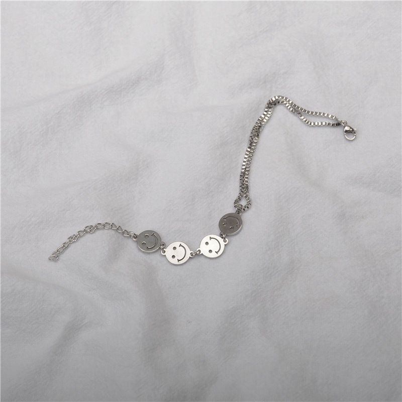 Vòng Đeo Tay Bằng Thép Titan Họa Tiết Mặt Cười Dễ Thương Bắt Mắt