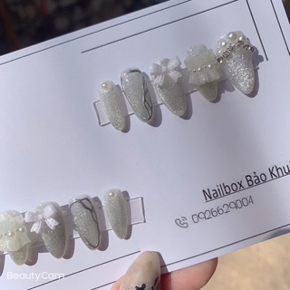 nail box- mẫu mắt mèo đính charm nơ( kèm theo keo dán với dũa )