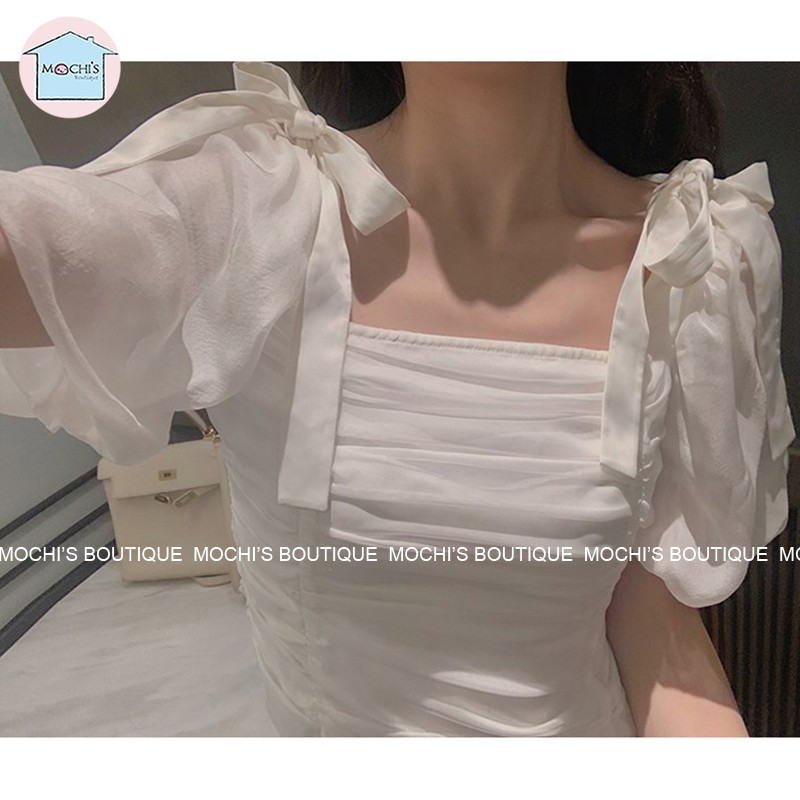 Đầm body dáng ngắn màu trắng nhún eo che khuyết điểm, mẫu váy đầm trắng cổ vuông tay phồng thắt nơ điệu đà-M065 | BigBuy360 - bigbuy360.vn