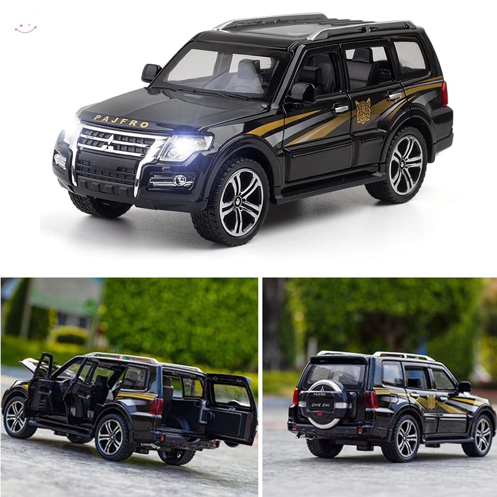 Mô Hình Xe Hơi Thể Thao Mitsubishi Pajero Bằng Hợp Kim Có Đèn Và Nhạc Mở Cửa Mở Được Giáo Dục Sớm Cho Trẻ
