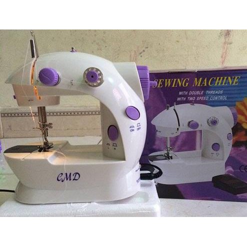 Máy khâu mini đa năng dùng được cả pin và điện