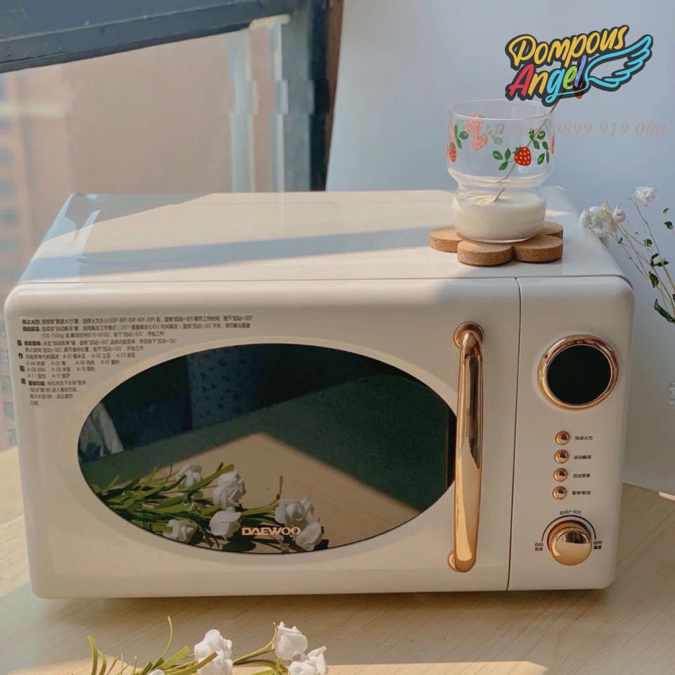 Lò vi sóng điện DAEWOO DY-WB02 màu trắng / đỏ viền vàng ,dung tích 20L bảo hành 12 tháng