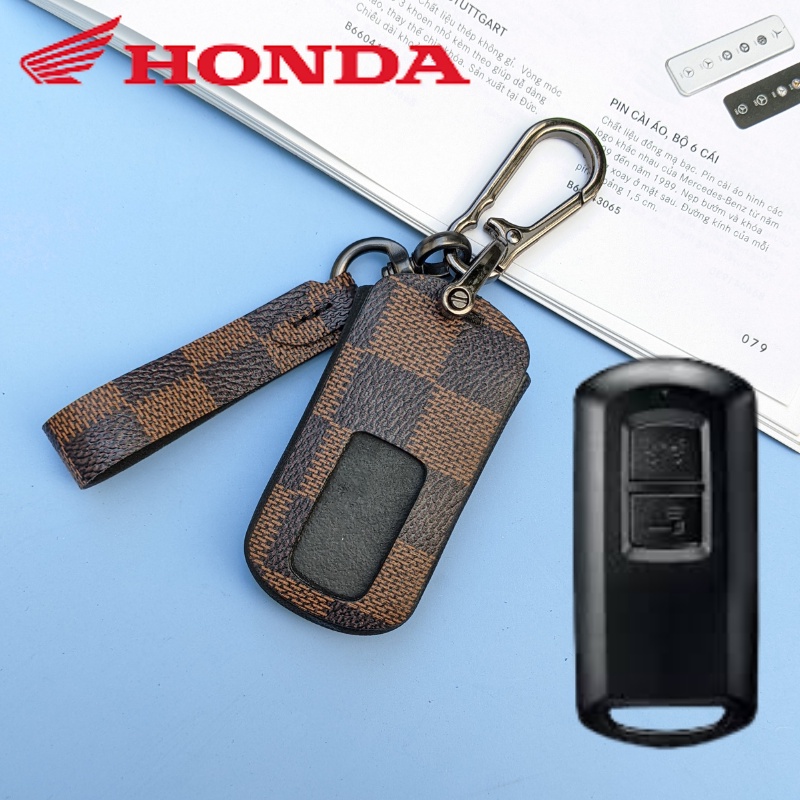 Ví da bọc smartkey vision màu LV (AB Móc D)
