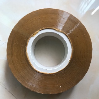 Băng dính vàng đục loại 1kg lõi mỏng