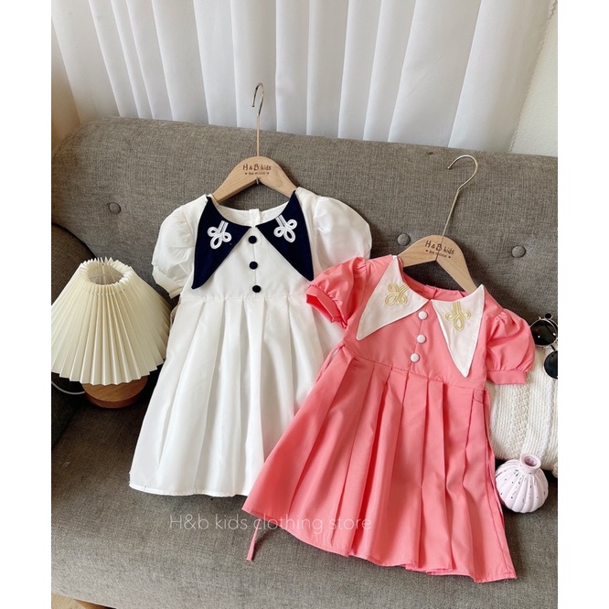 Xả Váy cổ nhọn thêu 2 màu cho bé gái