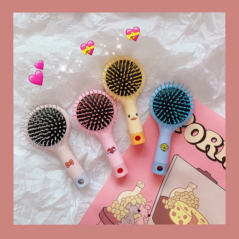 Lược massage kèm gương 2 trong 1 tiện lợi dành cho các bạn nữ chải tóc