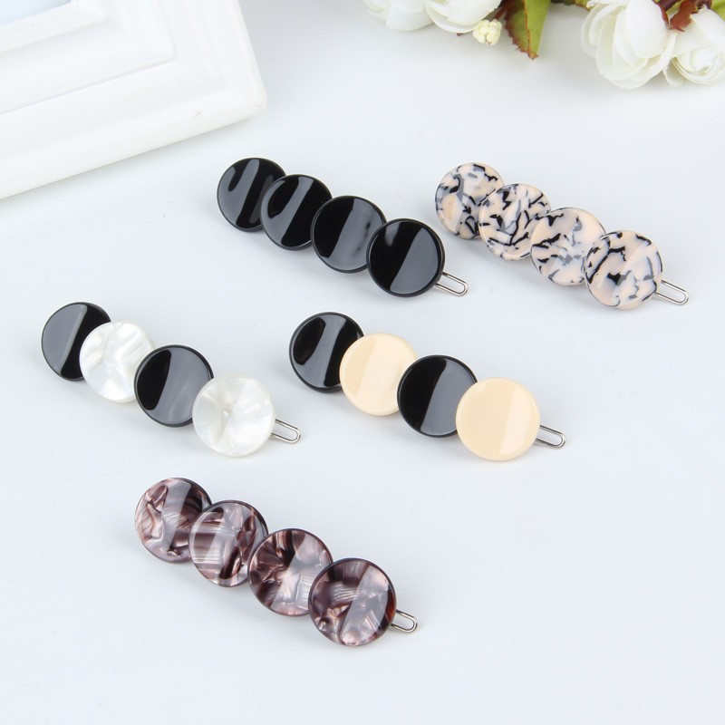 Kẹp tóc mái kiểu xà cừ