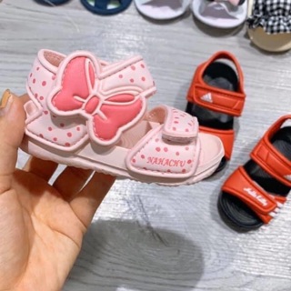 Dép nơ hồng nhạt chấm bi bé gái