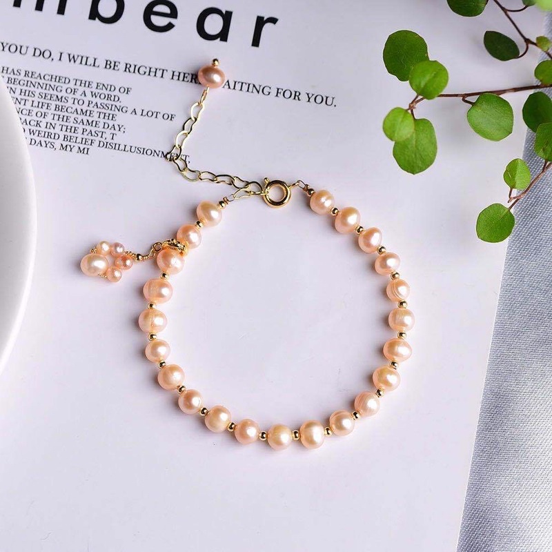 Vòng tay ngọc trai 7ly màu cam mix bi - NT41 - Ngọc Trai Trường Thịnh