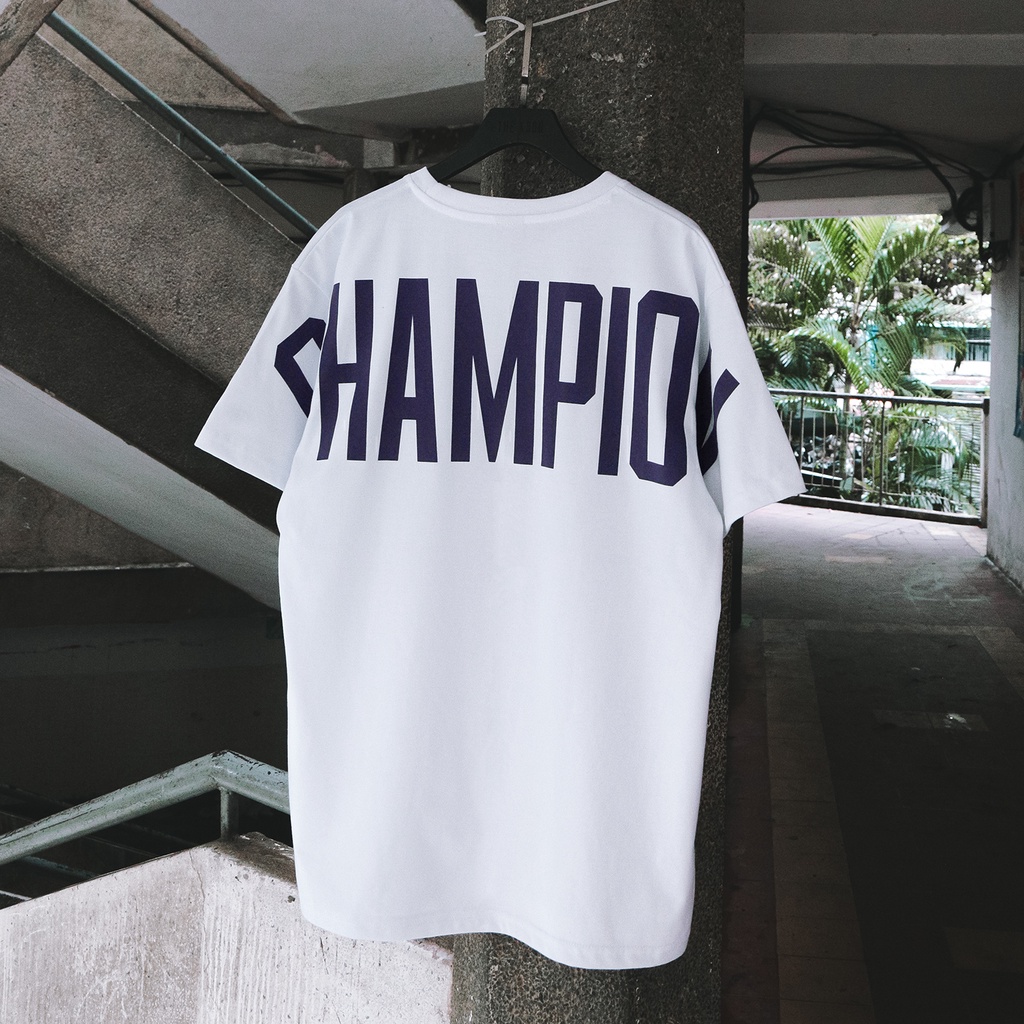 Áo Thun Trắng In Chữ Champion Màu Xanh Dương Nam Nữ Unisex Big Logo Vải Cotton Thoáng Mát