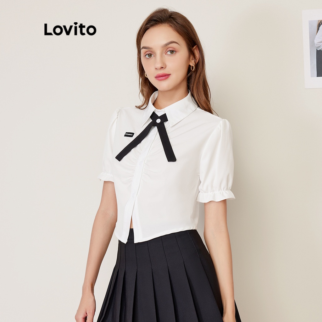 Áo Lovito có huy hiệu cổ thắt dây màu trơn phong cách thường ngày L27AD028 (màu trắng)