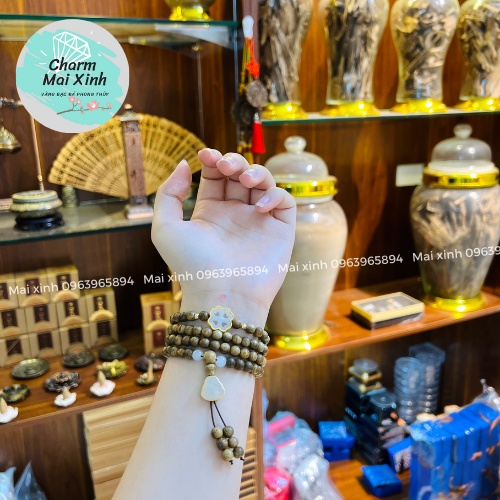 Chuỗi Trầm Hương Tốc Lào 108 hạt phối charm Cỏ 4 Lá + Quả Bầu Bạch Ngoc Bọc Bạc  - Vòng Tay Gỗ tự nhiên Nữ phong thuỷ