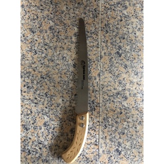 xứa cầm tai cán gỗ