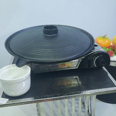 Vỉ, Khay nướng BBQ Hàn Quốc Kitchen Flower bằng gang giữ nhiệt tốt.