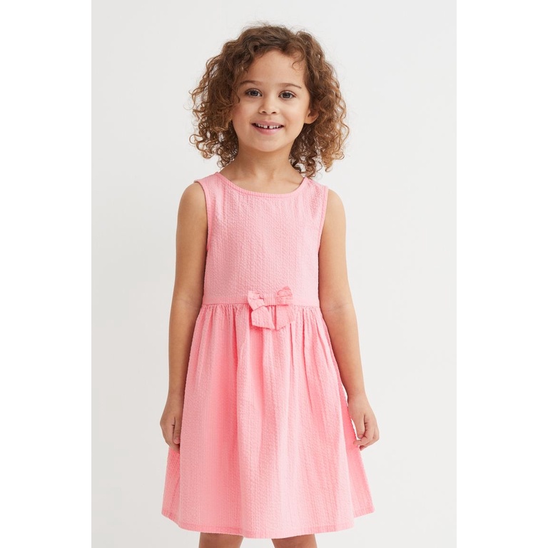 Váy xòe sát nách nơ hoa hồng hM H&M ko co giãn_hàng chính hãng authentic