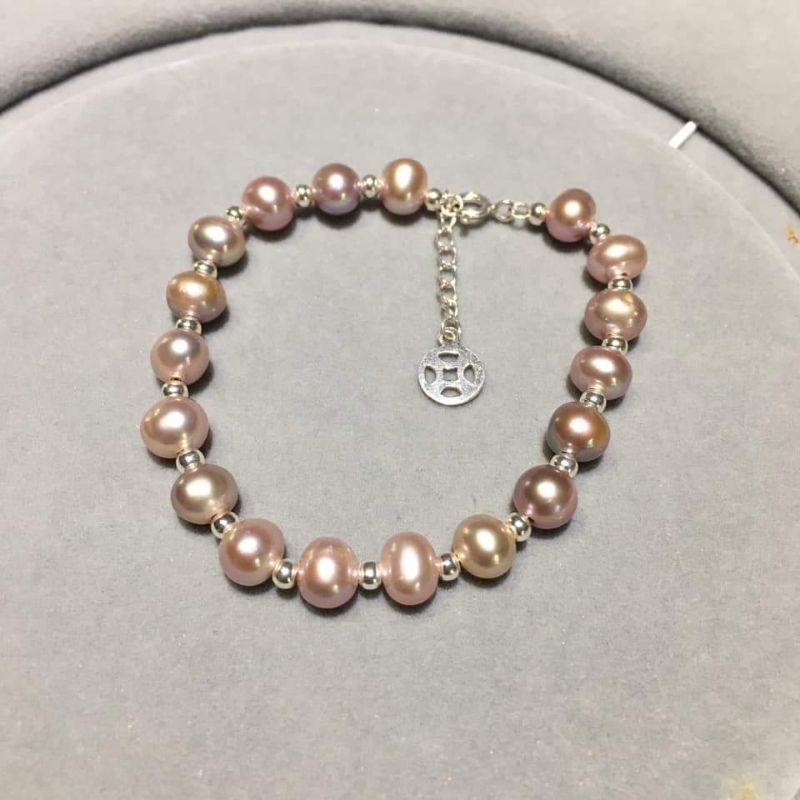 Vòng tay trai nước ngọt phối bi bạc xi vàng