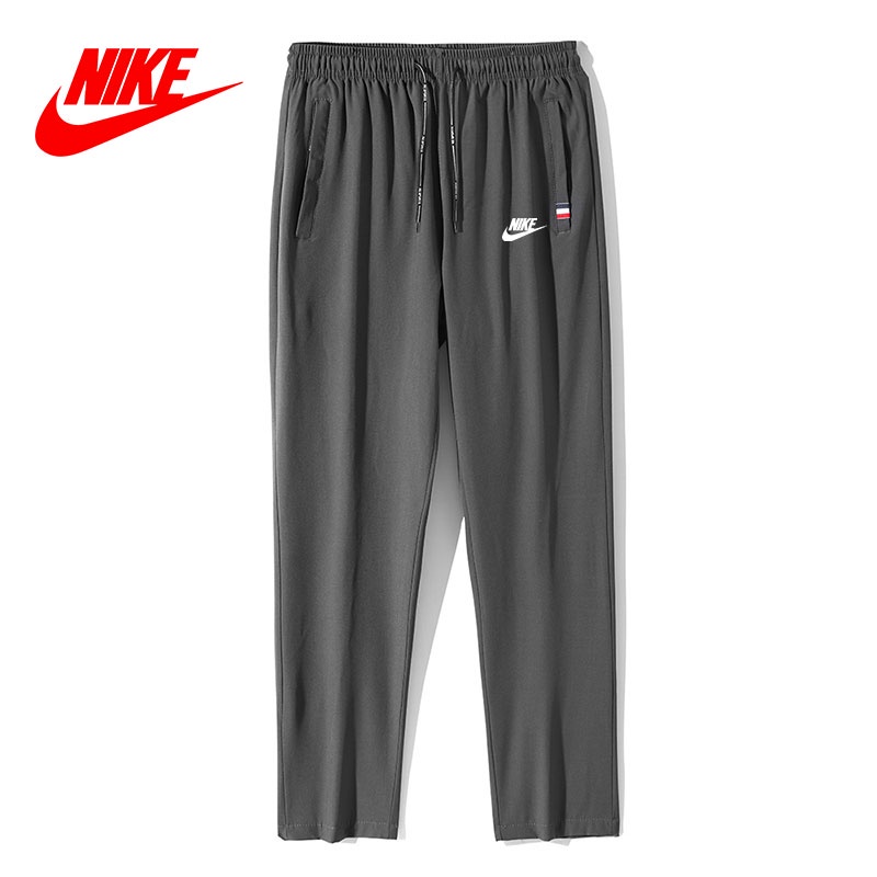 Quần chạy bộ Nike Phối Túi Khóa Kéo Thời Trang Năng Động Cho Nam
