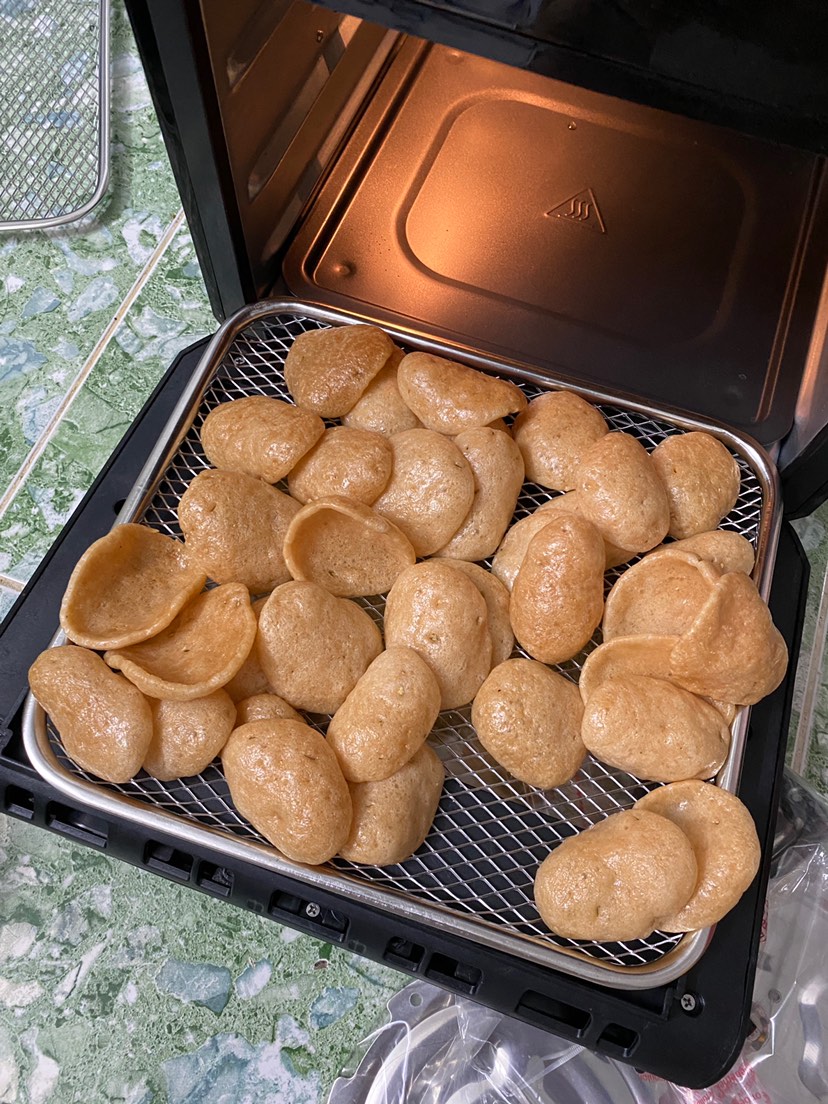 An aerial view of a field. A road runs through the upper right corner.