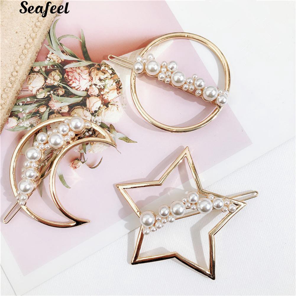Kẹp tóc kim loại hình trăng sao đính ngọc trai giả