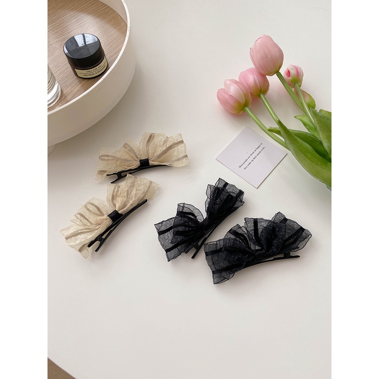 Kẹp tóc thắt nơ hai bên xu hướng thịnh hành Hàn Quốc