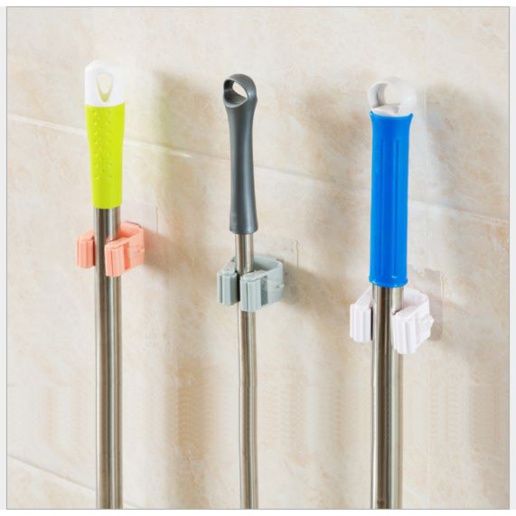 Móc dán tường giữ cây lau nhà / treo chổi không thấm nước