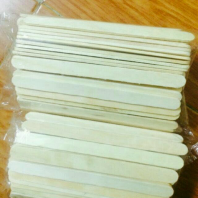 1 kg que đè lưỡi gỗ