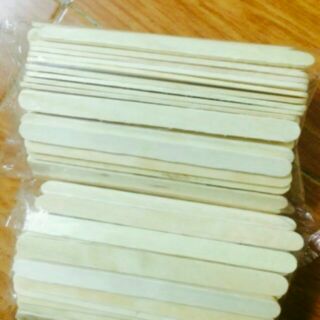 1 kg que đè lưỡi gỗ