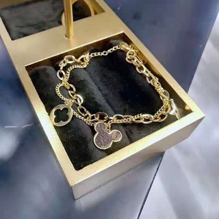 lắc tay titan Lv mạ vàng ko đen