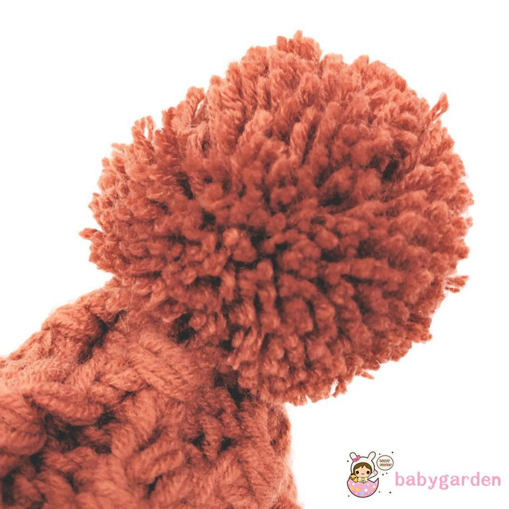 Mũ len trùm tai màu trơn có quả bông dễ thương cho trẻ em