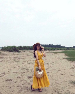 Đầm maxi peplum trắng vàng
