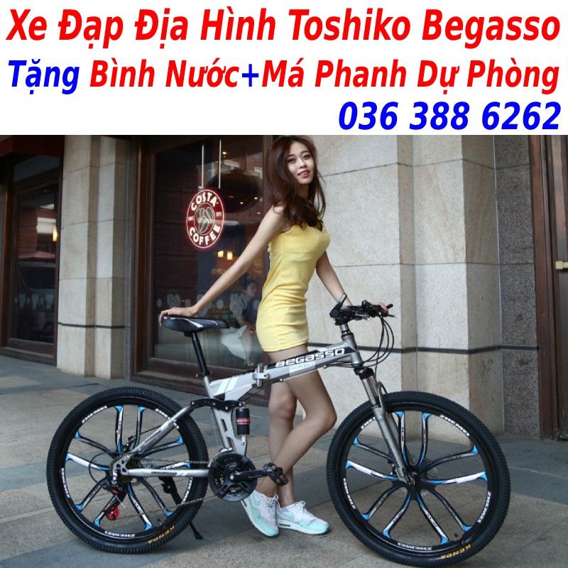 Xe đạp tập thể dục tập gym tại nhà Toshiko Sport Tặng má phanh + giá đỡ điện thoại + đồng hồ nhịp tim, bảo hành 5 năm