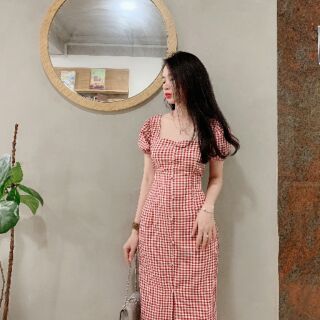 Đầm caro nút bọc cổ vuông tay phồng. Có nơ eo, tôn dáng cực kì nha. Đi tiệc đi chơi thoải mái khách nha. Đầm free size.
