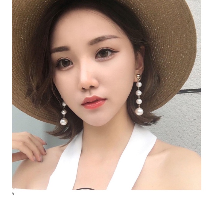 Bông tai Ngọc trắng dài 3 hạt đến 4 hạt..