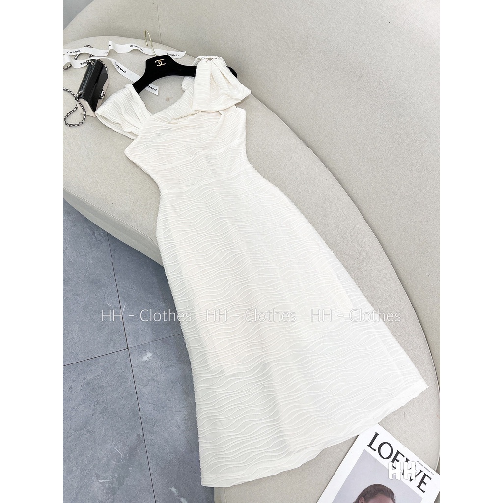 Váy xốp sóng lệch vai nơ