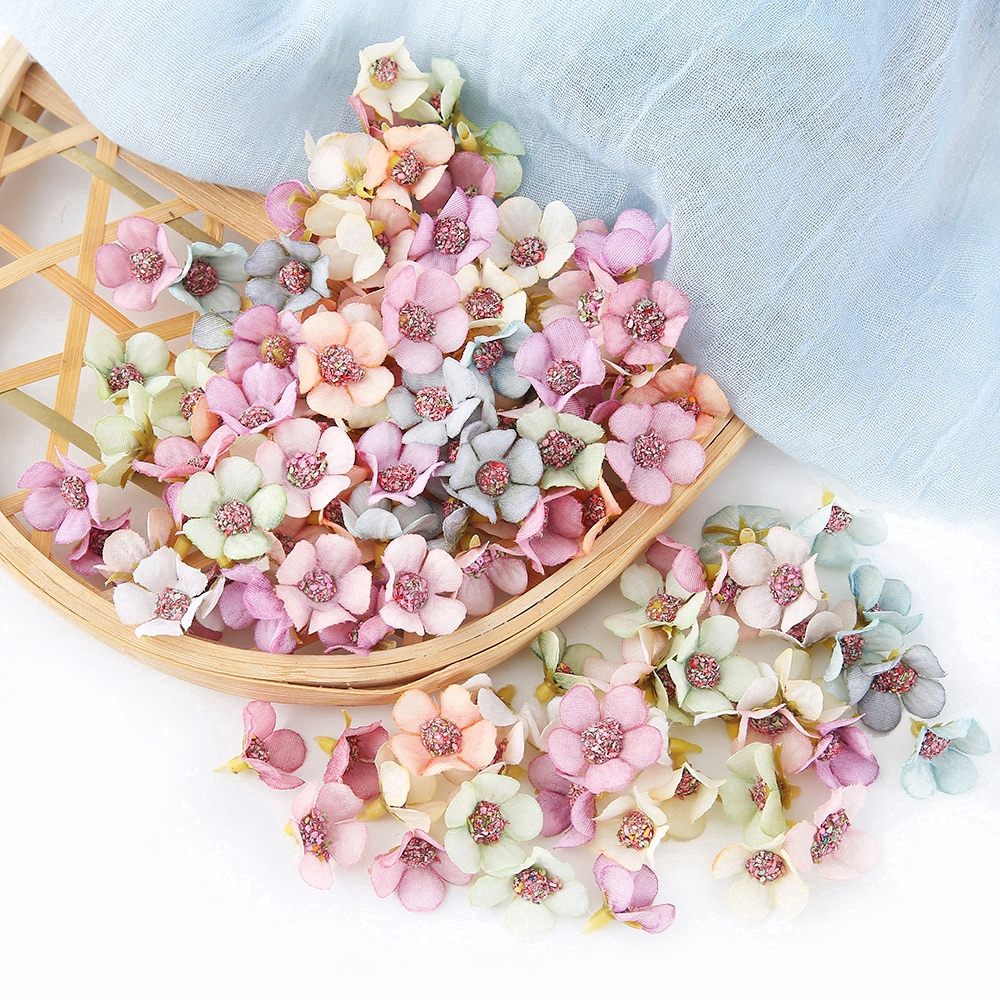 Bộ 50 bông hoa cúc nhân tạo chất liệu vải lụa dùng để trang trí