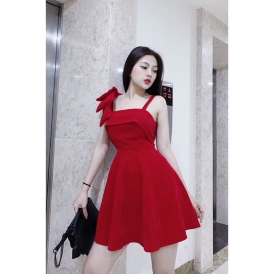 Đầm xoè Nhung đỏ tươi nơ đính vải cúp bằng vạt lật.
