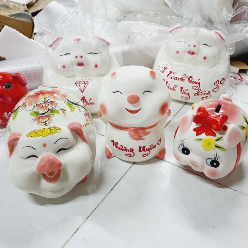Lợn đất tiết kiệm gốm sứ heo nơ hoa nổi size 3