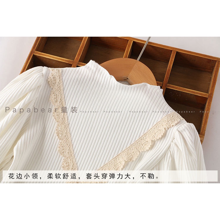 Áo tay phồng cổ cao thời trang xinh xắn cho bé gái