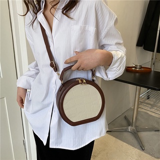 Túi da đeo chéo dáng tròn cỡ nhỏ
