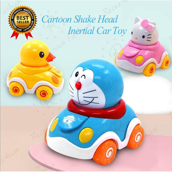 Xe đồ chơi lắc tạo hình Doraemon cho bé