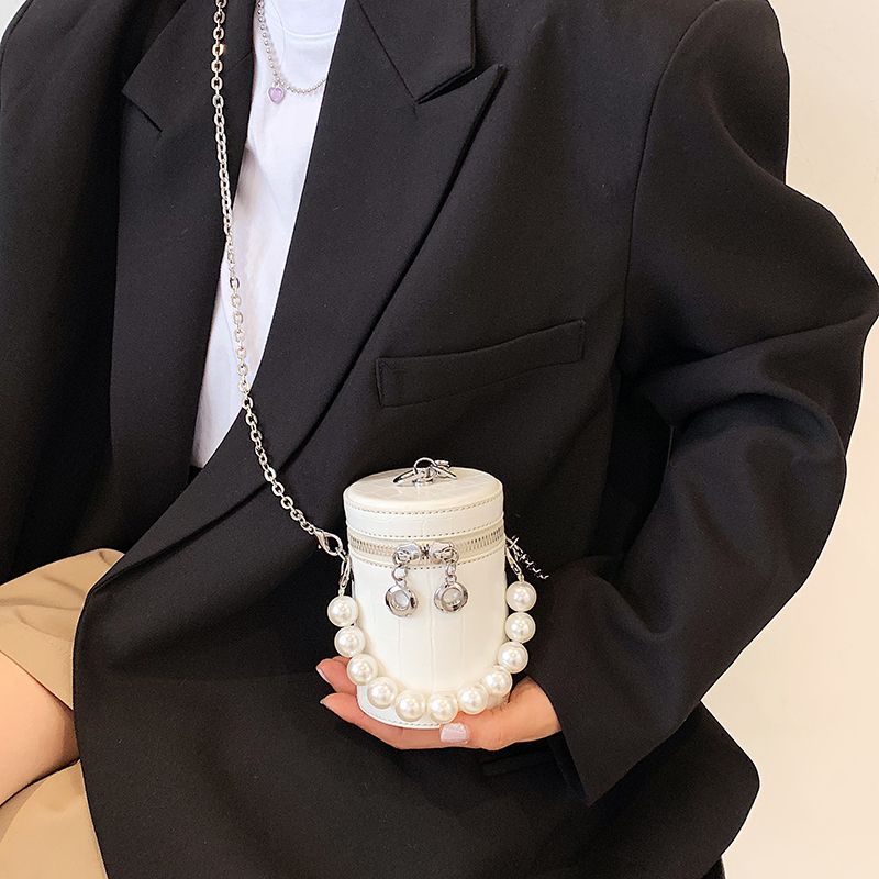 Túi sách, túi trụ da sần nhỏ xinh