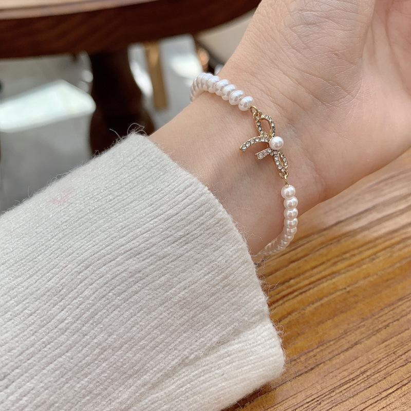 Vòng Tay Đính Đá Zircon Ngọc Trai Hình Nơ Xinh Xắn Cho Nữ