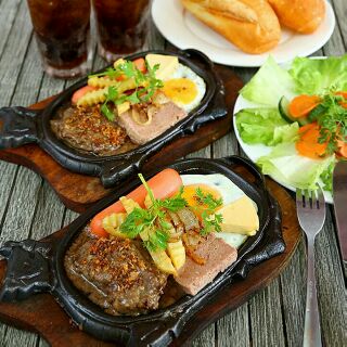 10 bộ chảo gang m bò bết tết kèm lót gỗ