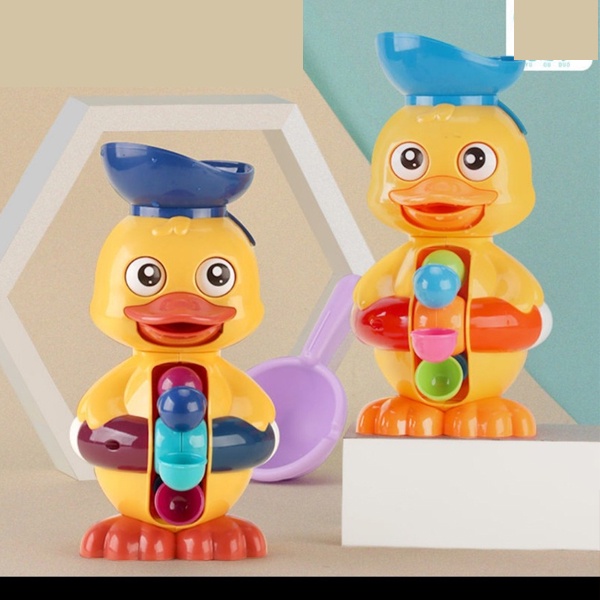 Đồ chơi nhà tắm, đi biển xúc cát Vịt con quay bánh xe nước